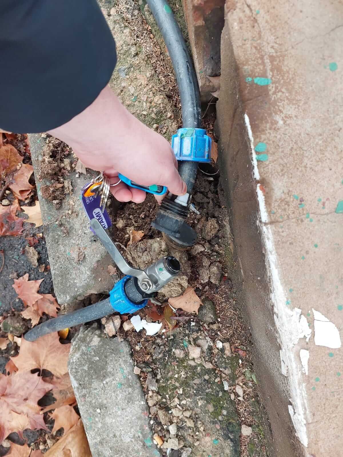 Plumber fixing a sink
